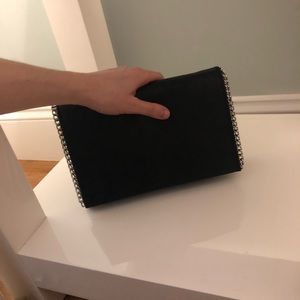 Brand new black suede clutch